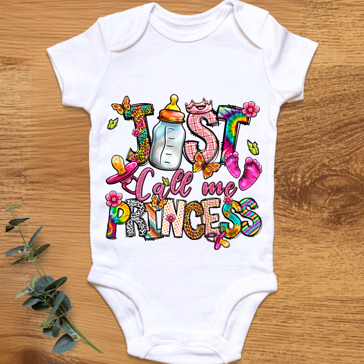 Cheeky baby onesie by By Delilah