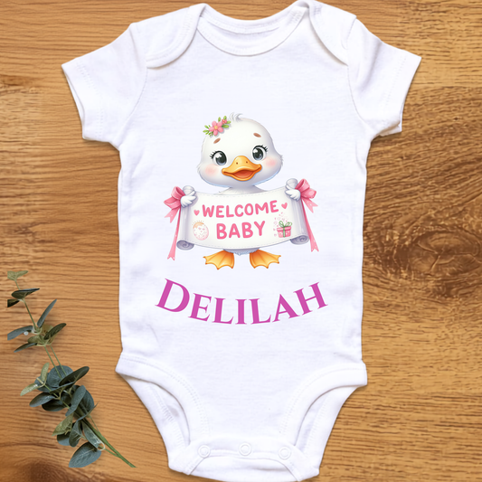 Welcome baby girl onesie with duck, personalised by By Delilah